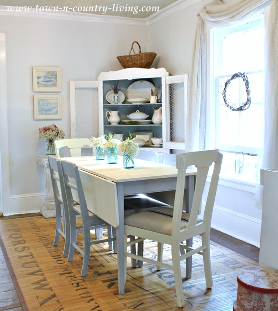Cottage style dining room with white walls