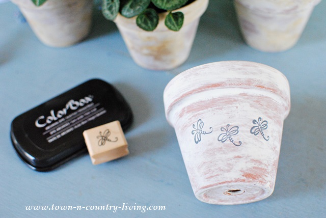 Stamping Whitewashed Clay Pots