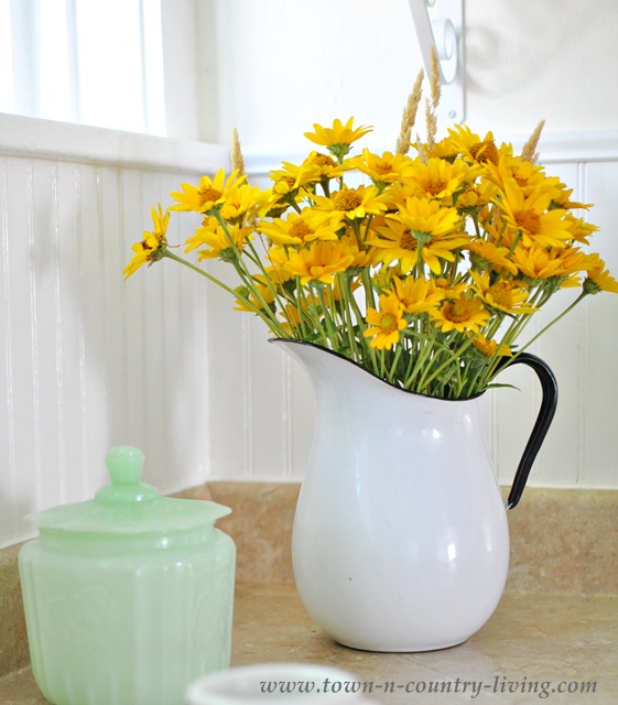 Yellow Wildflowers in Enamelware Pitcher from Town and Country Living
