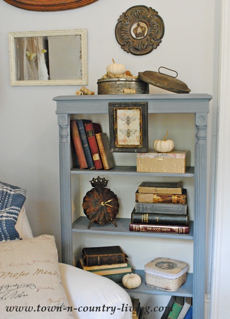 Bookcase Makeover from plain white to a painted two-toned application