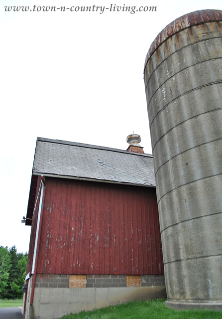Silo on a Rustic Red Barn