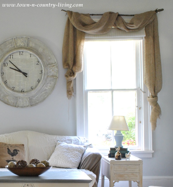 Burlap curtain swags via Town and Country Living