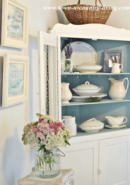 Dining hutch holds white ironstone