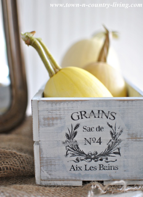 Fall decorating with a rustic crate and spaghetti squash