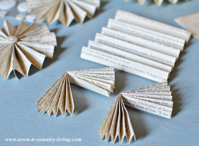How to make a paper fan garland via Town and Country Living
