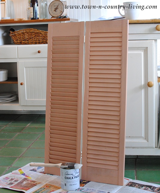 How to repurpose shutters into wall art via Town and Country Living