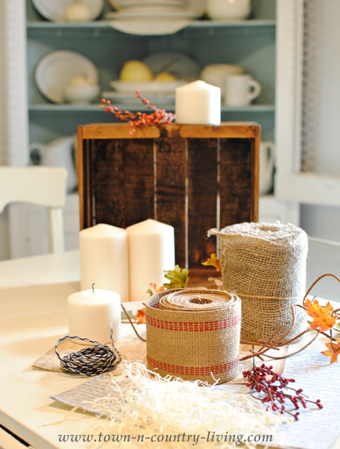 Supplies for making a fall centerpiece via Town and Country Living