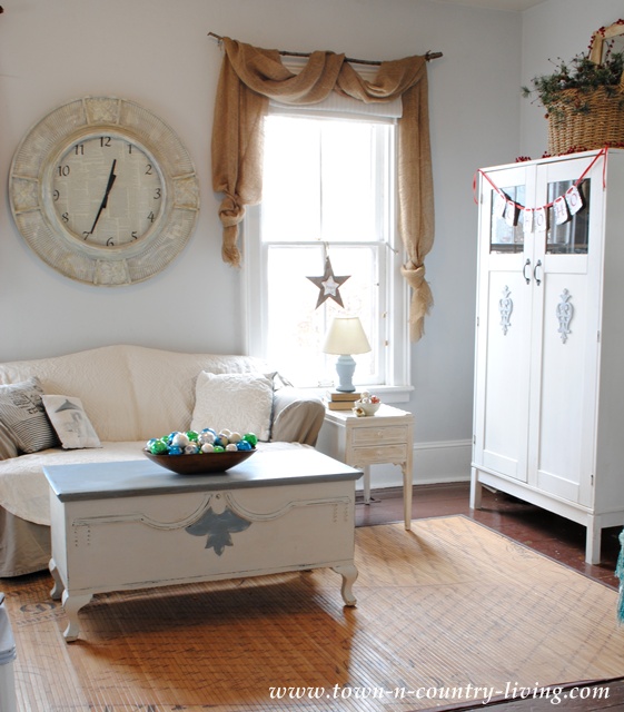 Farmhouse family room decorated for the holidays
