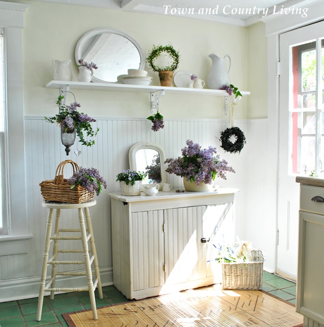 White ironstone and lilacs in a farmhouse kitchen