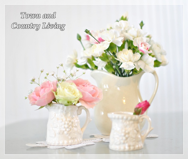 Roses and Carnations in Vintage White Pitchers