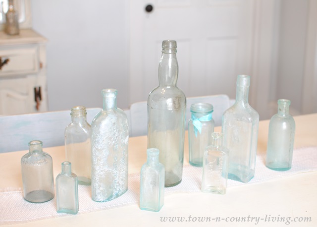 Collection of aqua bottles for a centerpiece