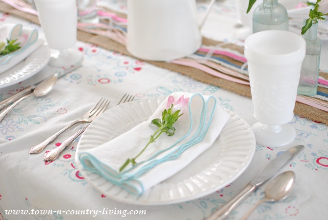 Spring table setting with vintage table cloth