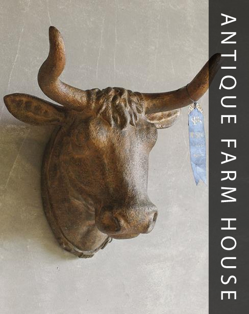 Antique-looking cow head adds farmhouse style.