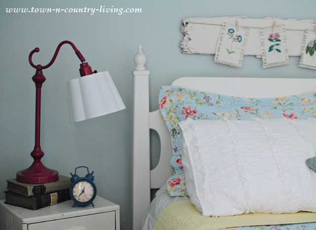 Farmhouse Bedroom with Raspberry Colored Lamp