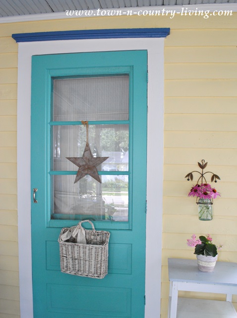 Took the leap and painted the front door a bold aqua color!