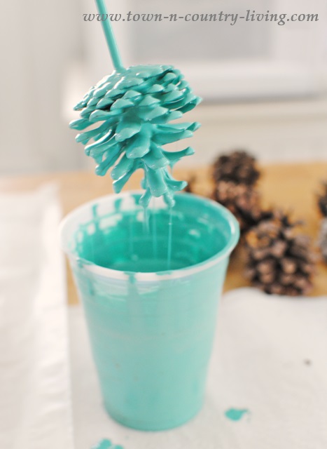 Dipping Pine Cones in Paint for a Custom Look