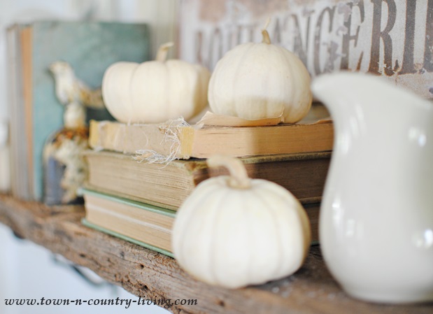 Baby Boos and Vintage Books on a Fall Mantel