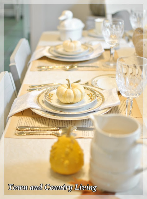 DIY Home Decor - Book pages are glued together to create simple place mats for this Thanksgiving table setting