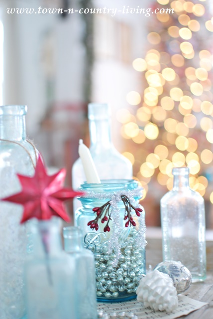 Vintage Aqua Bottles Create Christmas Vignette