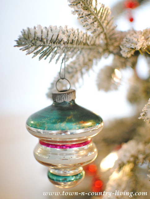 Vintage Christmas Decorating. Shiny Brite ornaments on a flocked tree