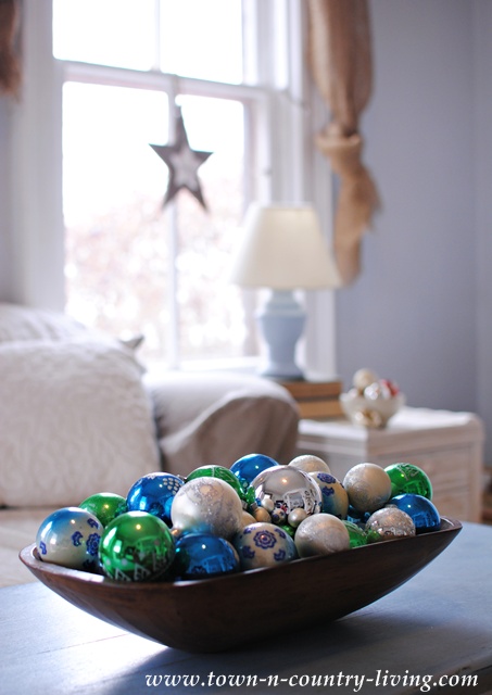 DIY Christmas Vignette. A simple wooden bowl filled with vintage glass ornaments.
