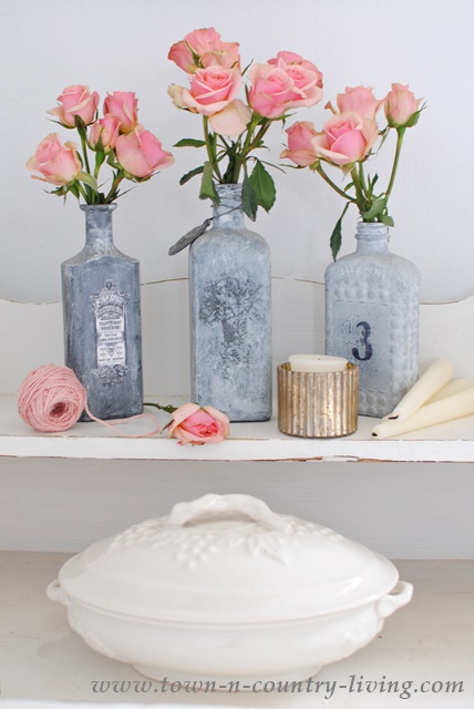Spray Roses pair with gray bottles and white ironstone