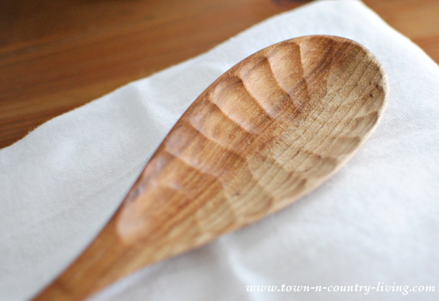 Signature chisel scallops on a handcrafted wooden spoon