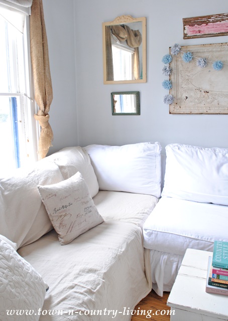Add a washed drop cloth to your sofa for a linen looking slipcover.