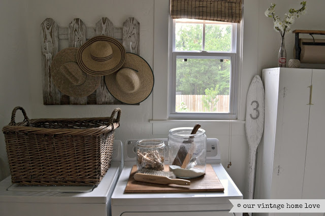 Laundry room in a 1905 farmhouse. See the rest of this charming home tour!
