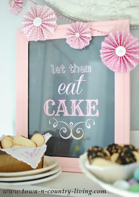 Old Frame is painted and turned into "Let them eat cake" sign for a dessert bar.