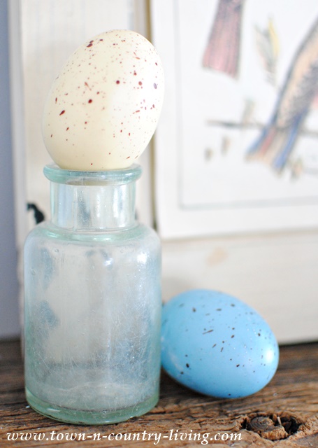 Spring Mantel with Eggs and Vintage Bottle