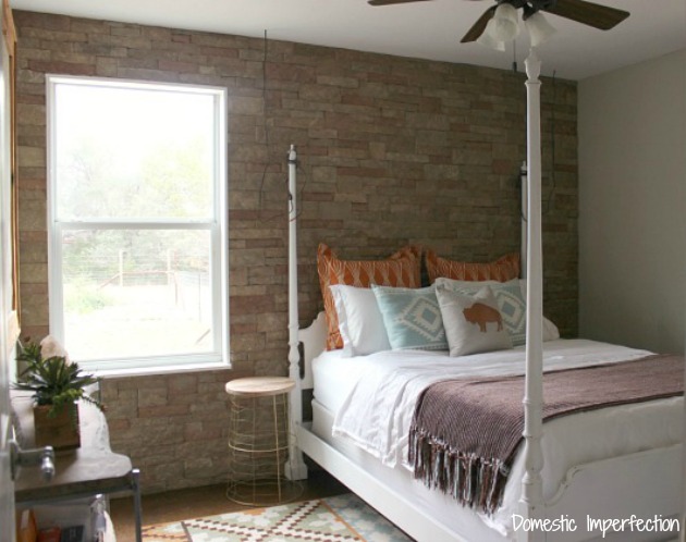 Guest Bedroom with Stone Wall