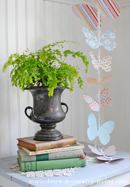 Make a paper butterfly garland with a free printable to download.