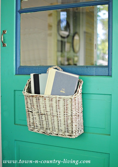 Basket of Books on the Front Door